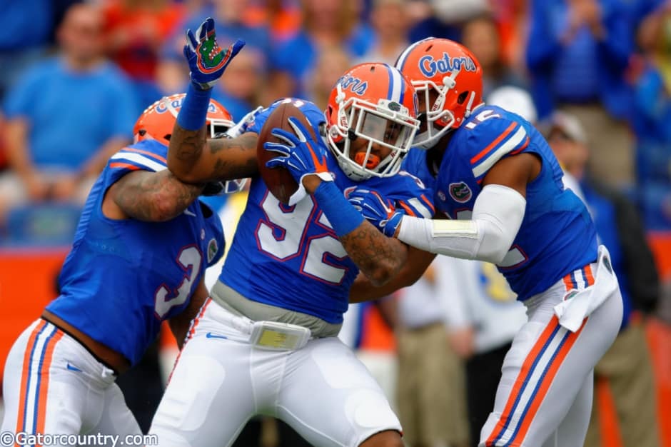 Florida Gator Football Players Tackle Each Other