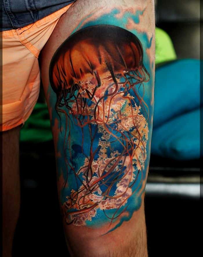 Colored-Jellyfish-Tattoo-On-Thigh