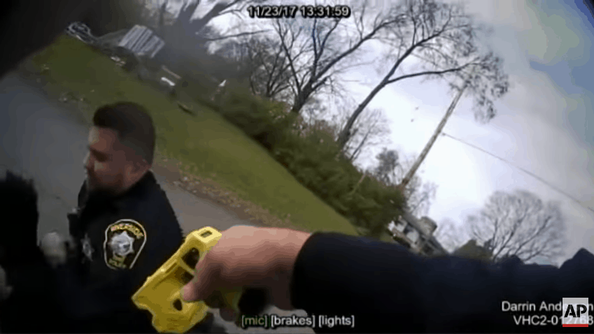 officer shoots partner taser gun