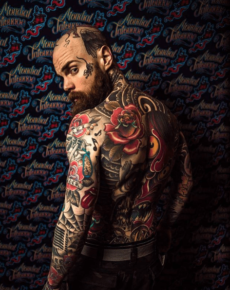teacher covered body tattoos